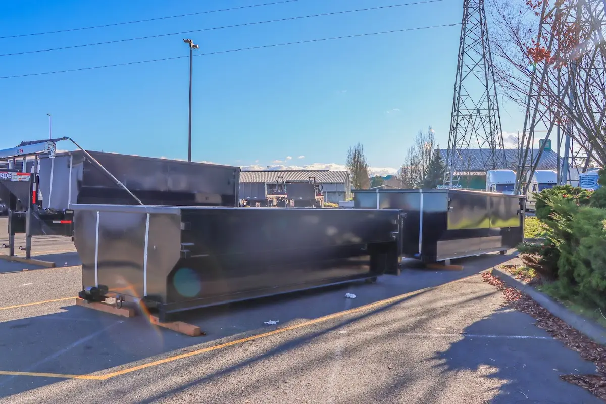 Roll-off dumpster ready for waste disposal at job site for 12 Yard Dumpster Rental in Salem